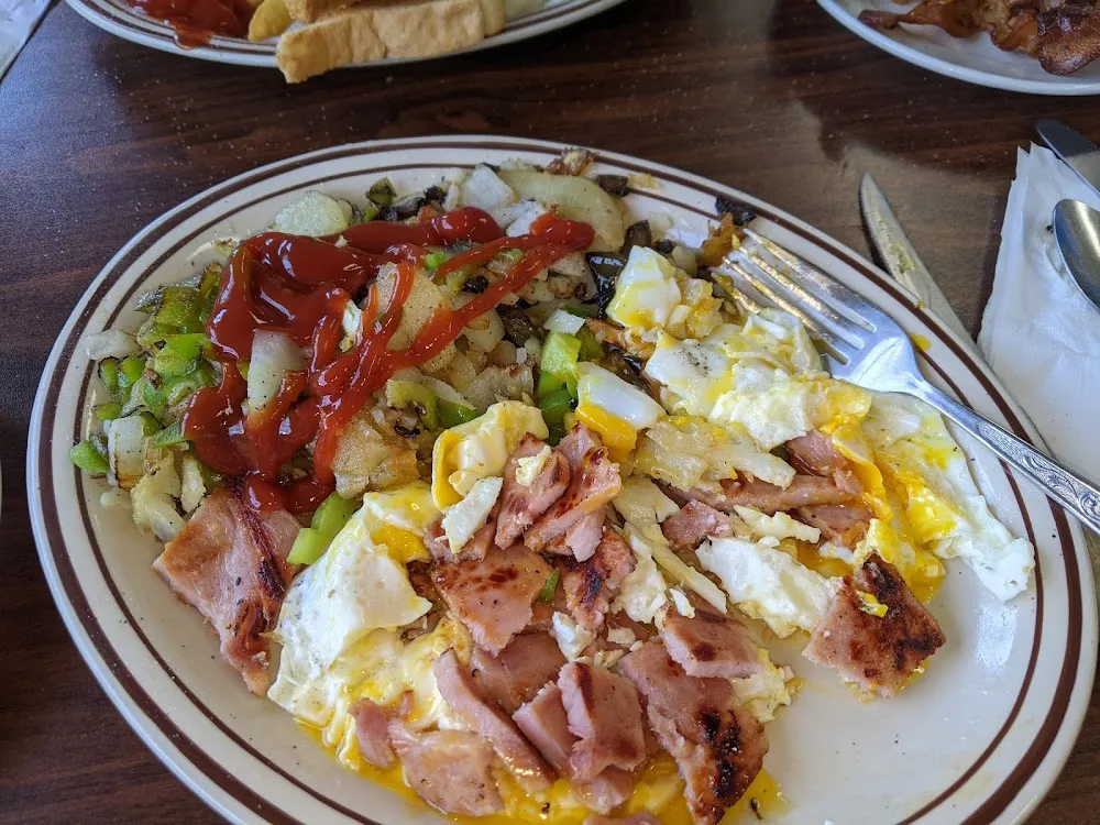 Three Eggs Ham and Home Fries with Onions