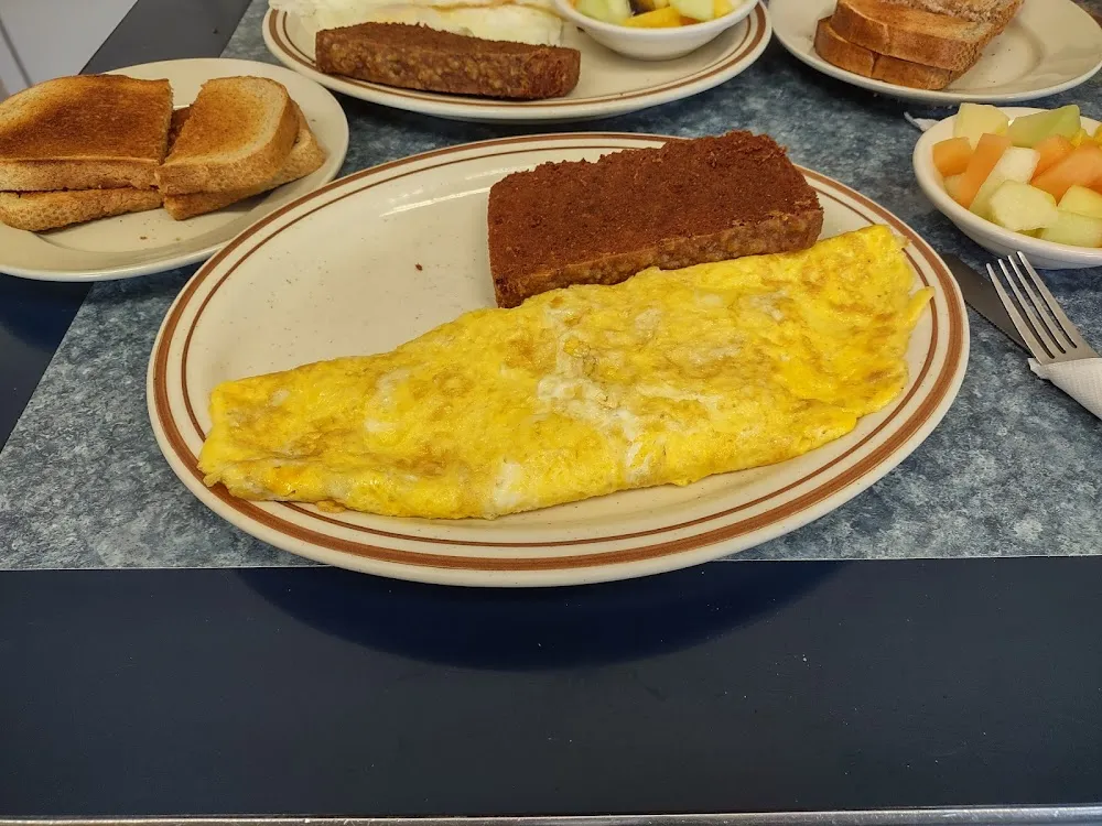 Triple Cheese Omelette Scrapple and Rye Toast