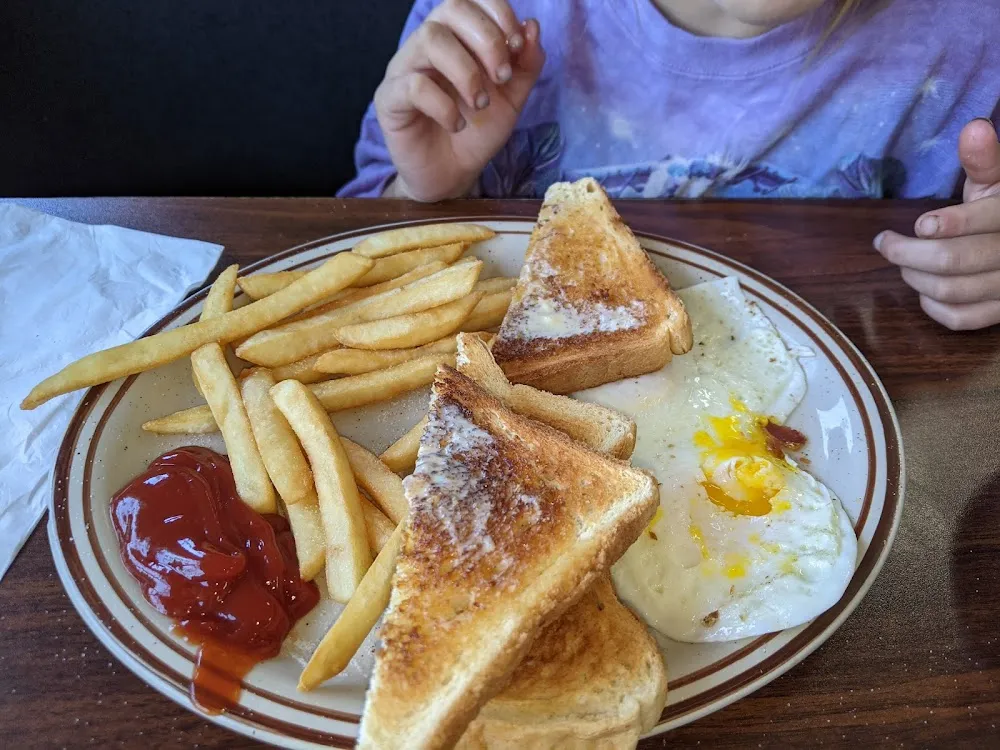 Two Eggs French Fries and Toast